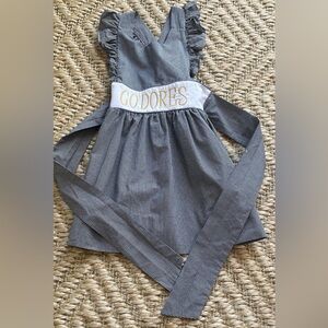 Vanderbilt black and gold apron dress with bow size 4 from Smockingbird